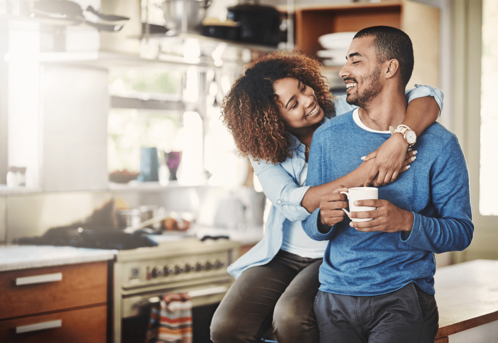 happy couple buying a home